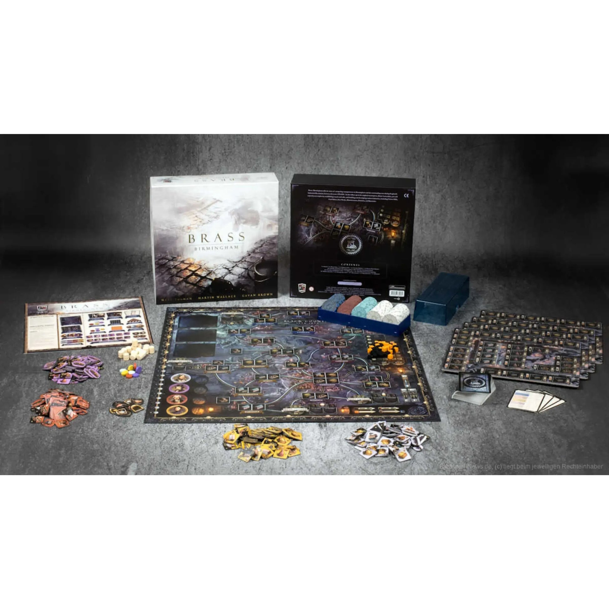 Brass: Birmingham board game box and components showing the industrial map, player boards, and resource tokens.